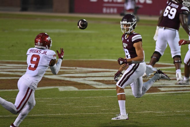 Mississippi State wide receiver Cameron Gardner (18) watches as Arkansas defensive back Greg Brooks Jr. (9) intercepts a pass during the first half of an NCAA college football game in Starkville, Miss., Saturday, Oct. 3, 2020.